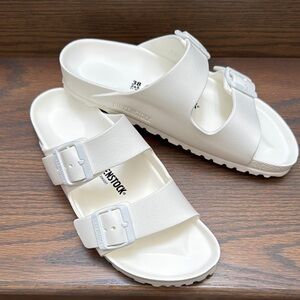 Birkenstock White Sandals with Adjustable Straps and Contoured Footbed